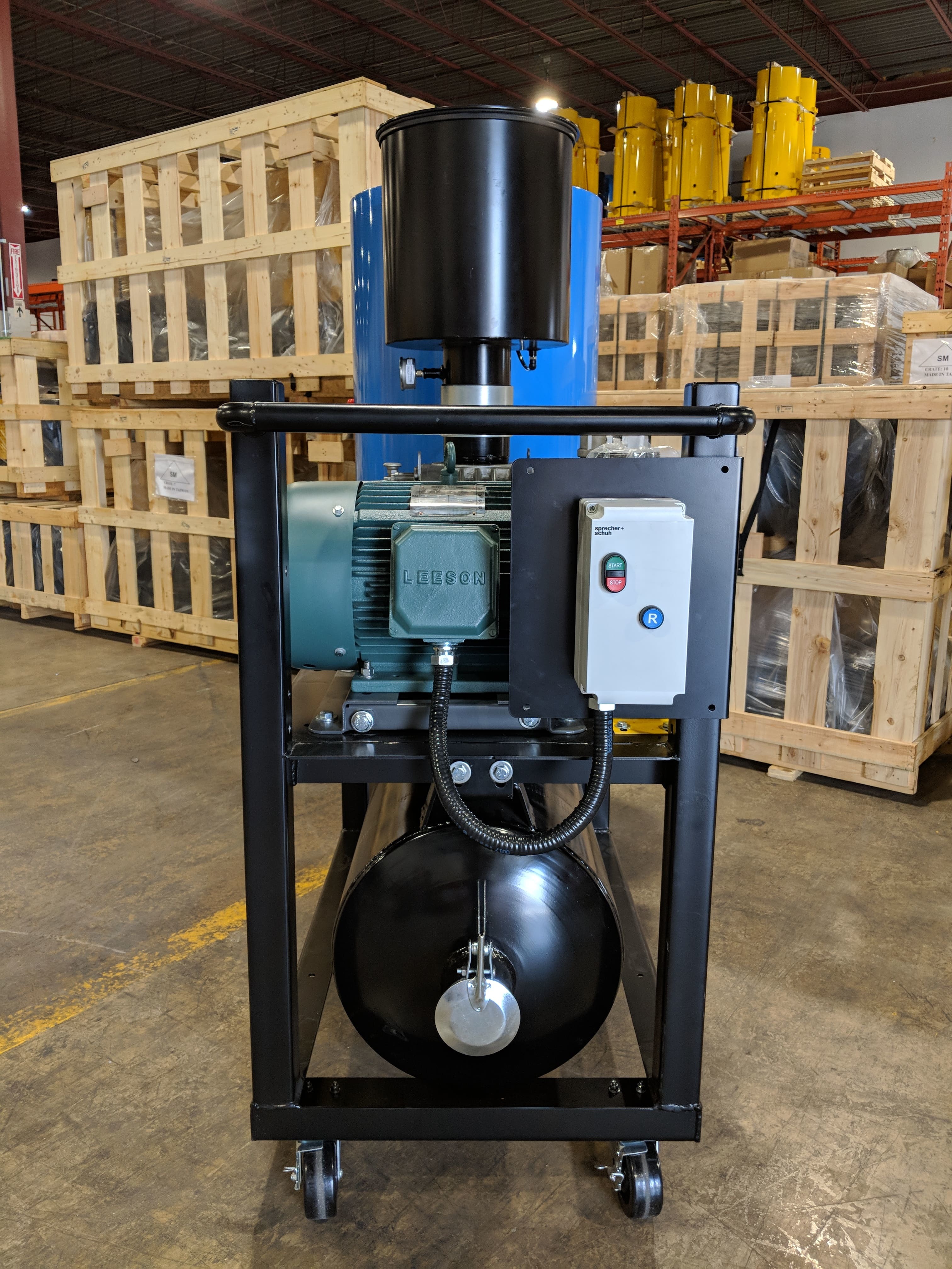 Front view of a DuroVac DVP industrial vacuum with its positive displacement producer, photographed by DuroVac